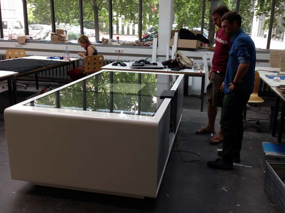Early hardware prototype of the BASF multitouch media table during development in the workshop.